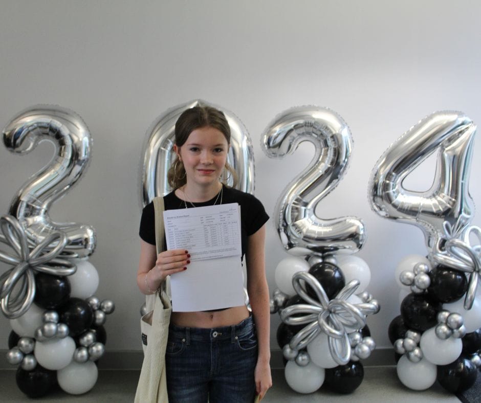 Image of Emily, a school leaver who achieved 4 grade 9s and 5 grade 8s.