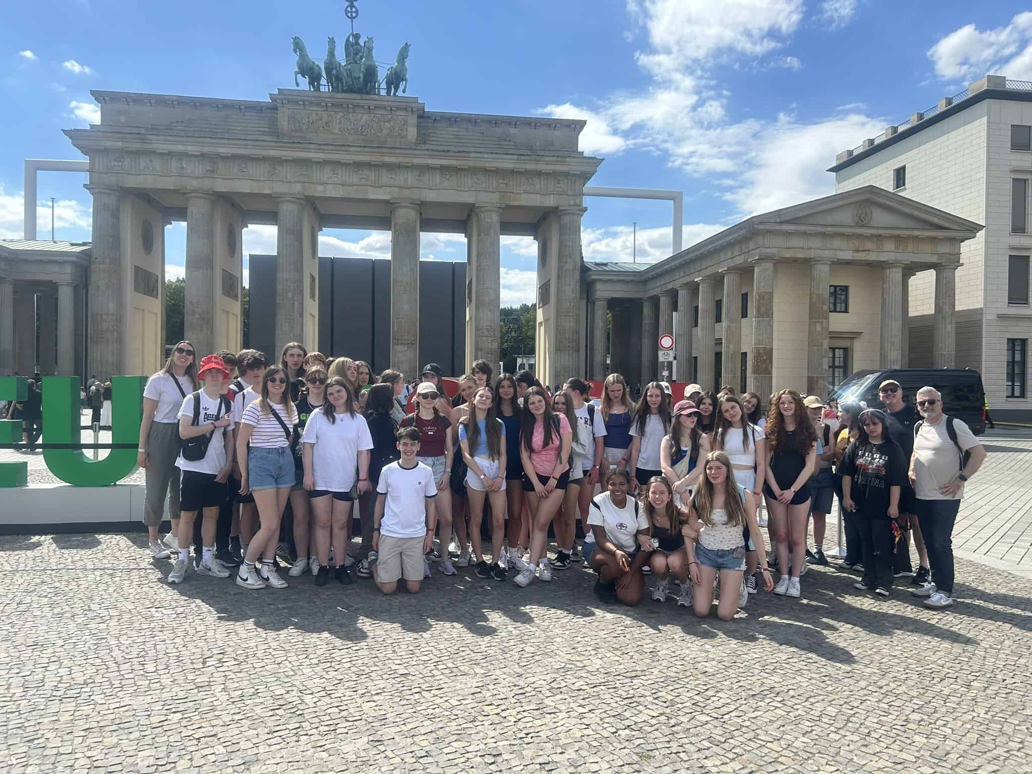 Priestnall School students stand in a large group in Berlin on a History Trip.